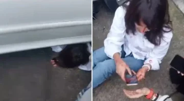 Se olvidó poner el freno de mano y su propio auto la atropelló